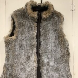 Vest is totally reversible,faux fur and brown
